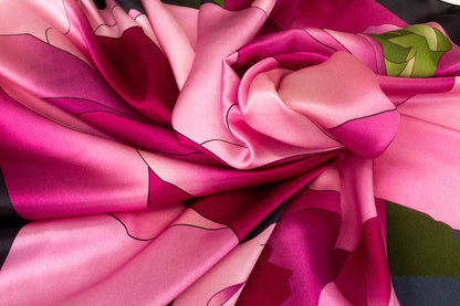 Botanical garden silk scarf folded display showing vibrant pink florals