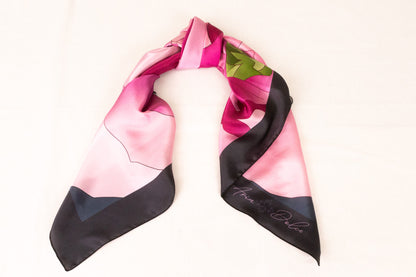 Pink silk scarf styled as handbag accessory accent piece