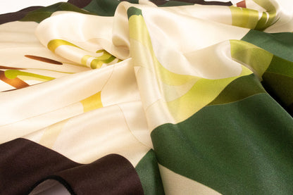 Green silk scarf with white lily floral pattern by Aria Dolce