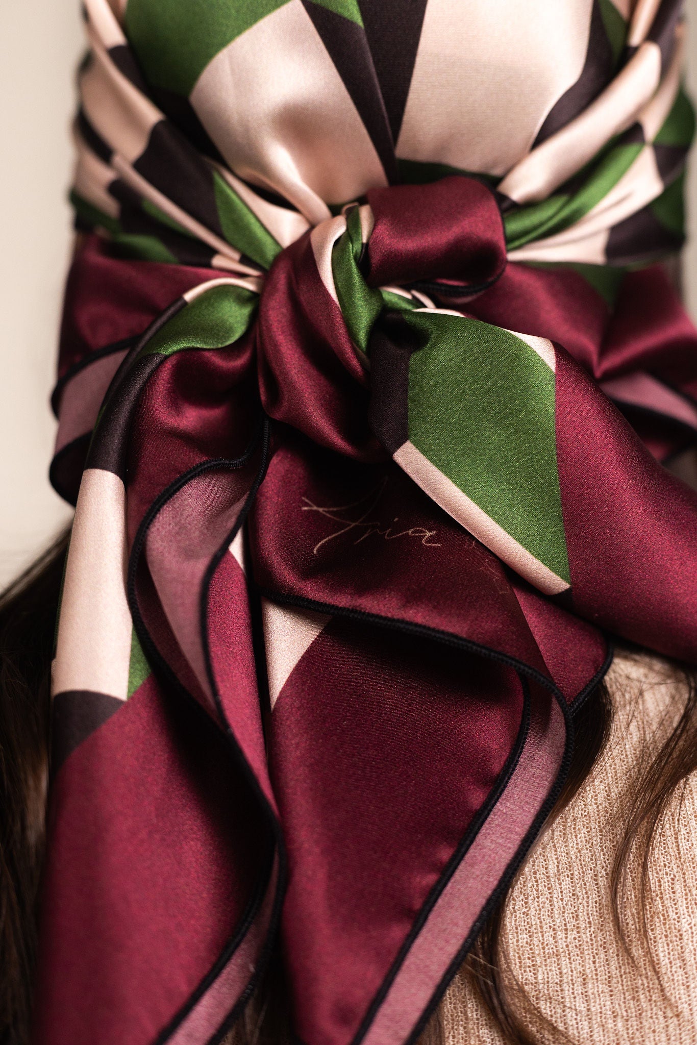 Chevron scarf styled as headscarf showing geometric pattern detail