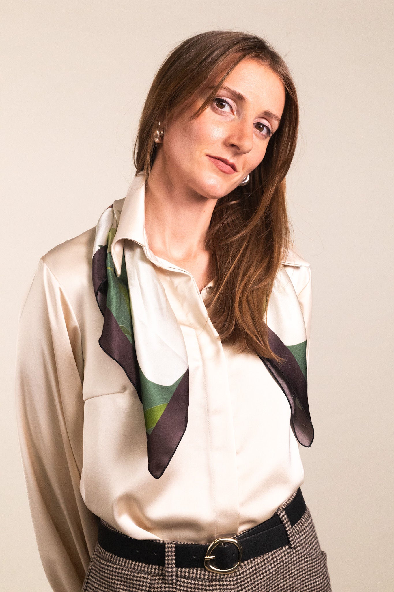 Green silk scarf with white lilies draped over shoulders